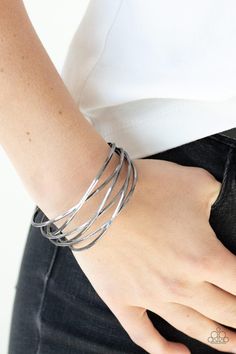 Paparazzi Accessories- Down To The Wire - Black  Bracelets Item #P9BA-BKXX-052XX   Shiny gunmetal wires crisscross across the wrist, coalescing into an edgy cuff.   Sold as one individual. Black Cuff Bracelet, Purple Necklace, Black Bracelets, Paparazzi Accessories, The Wire, Jewelry For Her, Paparazzi Jewelry, Pink Bracelet, Amazing Jewelry