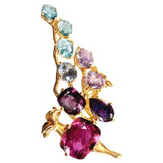 An unusual form makes this 18 karat rose gold contemporary cocktail cluster ring an art object. It is encrusted with: fancy pink and green sapphires, Paraiba tourmalines, spinel, 14.36 carats in total. This piece can be personally signed. The work is accurate and the piece sparkles as the perfect highlight. This ring model (as a ring) was chosen for the stage outfit by the german actress Anne Ratte-Polle, when she was receiving the Bavarian Film award, and for Berlinale red carpet same year. It Paraiba Tourmaline, Tourmaline Pendant, Gold Cocktail Ring, Purple Sapphire, Gold Cocktail, Flower Pendant Necklace, Rose Gold Engagement, Green Sapphire, Yellow Gold Pendants