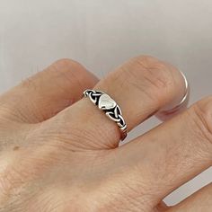 *  Sterling Silver Heart with Celtic Triquetra Ring, Boho Ring, Dainty Ring, Statement Ring, Silver Ring, may also wear as a midi ring or thumb ring, 925 Stamped  *  The heart symbolizes true love, and the crown is for loyalty, Crown represents power glory, immortality, royalty and sovereignty *  Perfect gift idea for any occasion: birthday, anniversary, engagement, graduation, bridesmaid, Mother's Day, Valentine's Day, Christmas, promise. *  Your purchase includes a gift box. Let us know if thi Symbolic Heart-shaped Promise Ring, Pretty Pegs, Celtic Ring, Silver Heart Ring, Ring Heart, Zierlicher Ring, Swirl Ring, Celtic Rings, Celtic Jewelry