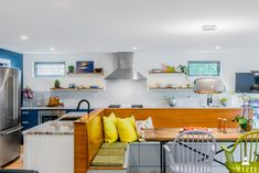 the kitchen is clean and ready to be used as a dining room or living room