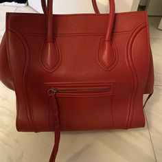 Celine, Red Leather Phantom Bag. Perfect Condition! High-end Red Shoulder Bag, High-end Red Crossbody Bag, High-end Red Top Handle Satchel, High-end Red Bag For Everyday Use, High-end Red Shopping Bag, High-end Red Shoulder Bag With Double Handle, High-end Red Leather Satchel, High-end Red Satchel For Shopping, High-end Red Satchel