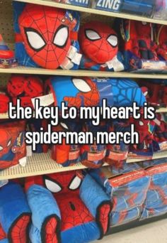 the key to my heart is spiderman merch stuffed animals are on display in a store