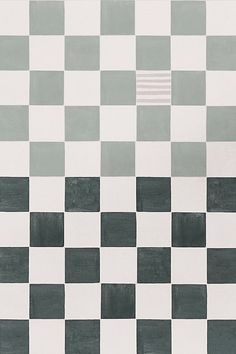 a black and white checkered wallpaper with grey squares