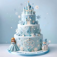 a birthday cake with a frozen princess figure on top