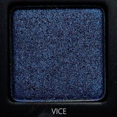 a blue eyeshade with the word vice on it's front and bottom corner