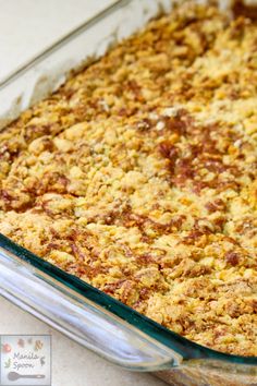 a casserole dish filled with food sitting on top of a counter