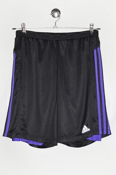 "Adidas sport shorts in black and purple, with leggings. - Size tag: Please always check measurements before buying. Men's L - Measurements (laying flat): Waist: 13\" stretches to 20.5\"   Outleg: 18.5\" Inleg: 8.5\" Thigh: 14\" Rise: 13\" Leg opening: 11.5\" -Wear: /Please see images for details/ Good used condition. Small fabric pulls and a snag as shown on the pictures. - Fabric: Polyester, Spandex *All of our items are preloved pieces so some signs of natural wear and age are to be expected. Please look through the photos carefully to check if the condition is to your satisfaction. *All efforts are made to show any defects however small imperfections may be missed. *We try to describe the sizes as accurately as possible, but please keep in mind that sizes nowadays can differ to sizes u Cheap Adidas Athletic Shorts For Sports, Purple Athletic Shorts With Built-in Shorts For Training, Sporty Purple Athletic Shorts With Built-in Shorts, Purple Athletic Shorts For Training, Purple Stretch Athletic Shorts With Moisture-wicking, Purple Moisture-wicking Stretch Athletic Shorts, Purple Athletic Shorts With Built-in Liner For Sports, Purple Athletic Shorts With Built-in Shorts For Sports, Purple Stretch Athletic Shorts For Sports