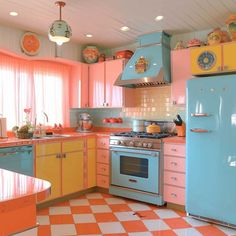 an old fashioned kitchen with pastel colors and checkered flooring on the walls