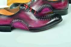 TucciPolo Prestigiously Handcrafted Burnish Purple Luxury Oxford Mens Italian Leather Shoes - offering superior comfort and exquisite design. Shop TucciPolo Collection of top quality mens Luxury Handmade Italian leather designer Shoes. Leather : Hand polish Italian Leather Sole: Double Leather Sole Construction: Oxford hand welted sole & sides Hand Stitched Color: Burnished Purple This is a made-to-order product. Each pair will be made upon receipt of order and shipped in approximately 15 da Elegant Purple Leather Shoes With Round Toe, Formal Purple Leather Shoes With Leather Sole, Men's Luxury Italian Oxfords, Luxury Multicolor Wingtip Leather Shoes, Luxury Men's Oxfords With Italian Craftsmanship, Luxury Italian Slip-on Oxfords, Luxury Italian Craftsmanship Leather Slip-on Shoes, Italian Leather Shoes, Mens Luxury