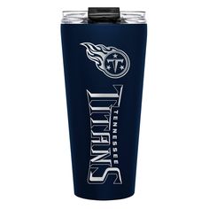 the tennessee titans travel tumbler is shown in blue with white lettering and flames on it