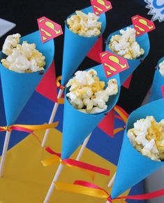 there are popcorn cones with superman logos on them