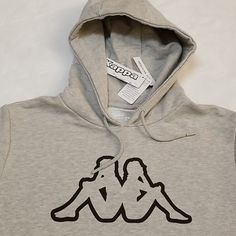 Brand New With Tags Attached Men's Size Large Kappa Hoodie. Color Grey. Msrp 64.00 Please See All Attached Pictures For Any Additional Details. Gray Hooded Top With Adjustable Hood, Winter Heather Grey Sweatshirt With Logo Print, Gray Hooded Sweatshirt With Logo Print, Kappa Hoodie, Colorful Hoodies, Black Gray, Gray Color, Black And Grey, Mens Shirts