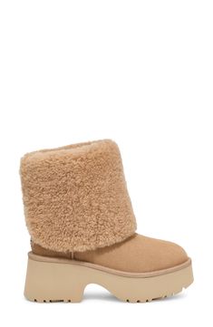 A tall shaft lined with genuine shearling folds down to double the styling options of a boot that's made of soft suede and kicked up on a lightweight foam sole. The foot is lined with cushy, warm UGGplush, a moisture-wicking textile made from a wool-rich blend but crafted to feel and wear like genuine shearling. 3 3/4" heel; 2 1/2" platform (size 11) 13" shaft; 17" calf circumference Pull-on style Leather and genuine shearling upper/wool-blend lining/synthetic sole Shearling may be sourced from Ugh Platform Boots, Platform Ugg Neumel, Ugg Heritage Platform Boots, Platform Ugg’s, Neumel Platform Ugg Boot, Hair Care Gifts, Xmas Wishlist, Oxford Heels, Walker Shoes