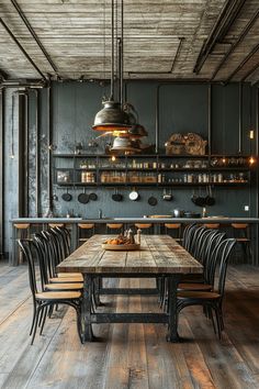 an industrial style dining room with wooden tables and chairs, hanging lights above the table