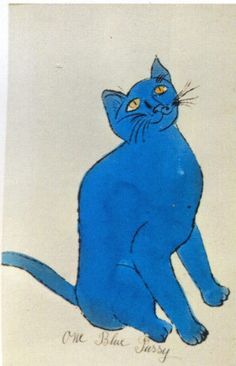 a blue cat with yellow eyes sitting down