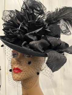 Ready to ship today from Tennessee, USA. I ship quickly and package safely in boxes. See https://www.etsy.com/shop/equineelan for more unique and distinctive choices.     This hat is ornate and vintage themed. Appropriate for any special event. The Sinamay base is heart shaped with a round edge and a pointed edge. This hat has lots of lace bows, black roses, and a large black ostrich plume give this hat its Victorian theme. Hat is attached with an elastic band that slides into two alligator clip Diy Victorian Hat, Elegant Halloween Fascinator, Black Mini Hat For Kentucky Derby Wedding, Black Costume Hats For Kentucky Derby Wedding, Elegant Top Hat For Halloween Party, Elegant Fitted Halloween Costume Hats And Headpieces, Elegant Black Headpiece For Carnival, Black Kentucky Derby Costume Hat, Elegant Black Hat For Halloween