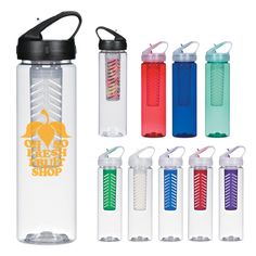 the water bottle is filled with different colored liquids