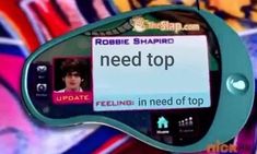 an electronic device with a sign that says need top