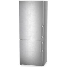 a silver refrigerator freezer sitting on top of a white wall