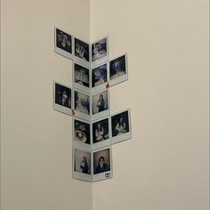 a group of pictures hanging on the wall with magnets attached to it's sides