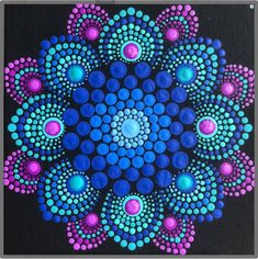 an abstract painting with blue, purple and pink circles