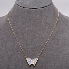 This is part of Chairish’s Fine Jewelry assortment.  This is our chic color statement butterfly without real color but, as you know, moonstone picks up on blues and greens so even though it appears creamy white, it can still be a pop of color.   14K Gold; .22 Ct Diamonds; 4.34 Ct Moonstone; 16 - 18 inches, Butterfly 25 mm x 17 mm White Butterfly Necklace In Fine Jewelry Style, Elegant Butterfly Gemstone Necklace, Elegant Gemstone Butterfly Necklace, Fine Jewelry White Necklace With Butterfly Charm, White Fine Jewelry Necklace With Butterfly Charm, Blues And Greens, Space Rock, Butterfly Necklace, Accessories Jewelry Necklace