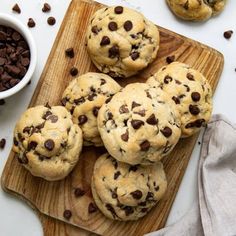 chocolate chip cookies on a wooden cutting board