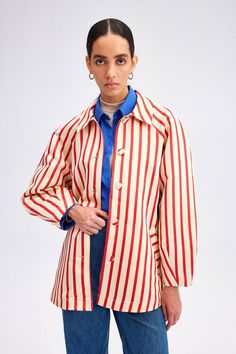 SHIPS OUT DEC 15TH This stylish red and white striped belted jacket offers effortless style with an added dose of fun. The adjustable belt creates a tailored look while the bubble sleeves add a playful touch. Sashay into the room and set the trend with this unique piece! * Height: 78 cm * Chest: 112 cm * Sleeve Length: 76 cm * Model Height: 177 cm * Model Size: 36 * Fabric: * %100 Polyester Striped Retro Outerwear For Work, Retro Striped Outerwear For Work, Belted Jacket, The Bubble, Striped Jacket, Red And White Stripes, Adjustable Belt, The Trend, Color Stripes