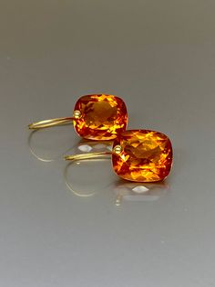 Gorgeous Madeira Citrine drops earrings. The Madeira Citrine drops are Flawless and have a beautiful rich golden whiskey color. The drops attached to vermeil on sterling ear wires. The earrings are elegant and have a lux look. A truly gorgeous pair of earrings. *Quality: AAA+ Quality (25 ct) *The dimension of stones is about 14mm *Metal: vermeil on sterling *Earrings drop length (ear wires including the stones): 27 mm/1.1 inch Solid gold, 14K gold-filled, sterling silver, and gemstones are my ma Citrine Drop Earrings, Citrine Jewelry, Citrine Earrings, Yellow Citrine, November Birthstone, Earrings Drop, Jewelry For Her, Small Earrings, Minimalist Earrings