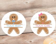 two round stickers with the words team boy and a ginger on them, sitting next to a pair of sandals