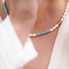 A fun and fabulous cultured freshwater pearl necklace with gorgeous turquoise to give that all important pop of colour!    An essential addition to your summer wardrobe - perfect for daywear on the beach as well as sunset dining in exotic locations.   ﻿ Oval cultured freshwater pearl necklace with18kt gold fill beads and turquoise beads with gold plate lobster clasp & ext. chain. Please note gemstones, like people, are unique and therefore may have natural inclusions or inflections. Pearls are quite soft and need special care after you wear them. Always store them in a separate jewellery pouch away from other jewellery and it is best to keep them in something soft.  From time to time, after you wear your pearls you should wipe them with a soft damp cloth to prevent dirt, chemicals and pers Turquoise Jewelry With Pearl Chain And Round Beads, Turquoise Beaded Necklace With Pearl Charm As Gift, Turquoise Pearl Necklace With Round Beads, Turquoise Pearl Necklace With Natural Stones, Turquoise Necklace With Round Pearl Beads, Turquoise Pearl Necklace With Pearl Charm As Gift, Turquoise Necklace With Pearl Chain And Round Beads, Turquoise Pearl Necklaces With Pearl Charm, Turquoise Pearl Necklace Gift