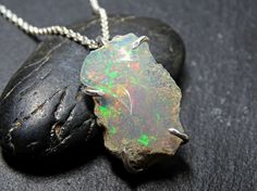 raw opal necklace silver welo opal pendant silver by CrazyAssJD Silver Opal Necklace Gift, Silver Opal Necklace For Gift, Silver Opal Jewelry With Natural Stones, Nickel-free Opal Necklaces As Gift, Silver Ethiopian Opal Pendant Jewelry, Handmade Silver Necklace With Ethiopian Opal, Nickel-free Opal Necklace Gift, Handmade Ethiopian Opal Silver Necklace, Silver Ethiopian Opal Pendant Necklace