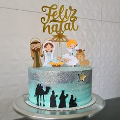 there is a cake that has been decorated with nativity