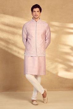 Pink bundi with floral embroidered motifs, mirrorwork and welt pockets. Comes with kurta and pant. - Aza Fashions Wedding Eid Nehru Jacket With Gota Work, Nehru Jacket With Gota Work For Wedding And Diwali, Wedding Nehru Jacket With Gota Work For Eid, Eid Wedding Nehru Jacket With Gota Work, Traditional Nehru Jacket With Gota Work For Festive Occasions, Wedding Nehru Jacket With Gota Work For Diwali, Festive Nehru Jacket With Gota Work For Wedding, Eid Nehru Jacket In Raw Silk With Mirror Work, Festive Nehru Jacket With Gota Work For Eid