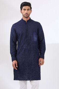 Midnight blue kurta with tonal thread embroidery in floral jaal pattern. Paired with a white cotton silk pant. - Aza Fashions Indigo Kurta With Floral Embroidery For Eid, Indigo Floral Embroidered Kurta For Eid, Indigo Kurta With Resham Embroidery For Eid, Traditional Indigo Kurta With Chikankari Embroidery, Indigo Traditional Wear With Chikankari Embroidery For Diwali, Eid Indigo Kurta With Resham Embroidery, Formal Blue Kurta With Floral Embroidery, Elegant Blue Jamawar Kurta, Indigo Kurta With Chikankari Embroidery For Diwali