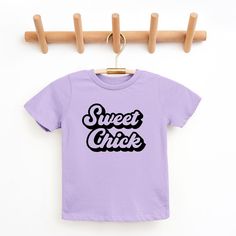 Looking for a cute tee for your kids? We have the perfect Sweet Chick graphic tee addition to their closet! Also available in toddler tees. Cute Slogan T-shirt, Casual Purple T-shirt For Birthday, Playful Purple Cotton T-shirt, Purple Graphic Print T-shirt For Birthday, Cute Purple Top With Letter Print, Lavender Short Sleeve T-shirt With Graphic Print, Casual Purple Birthday T-shirt, Fun Purple T-shirt With Funny Print, Cute Purple Short Sleeve T-shirt