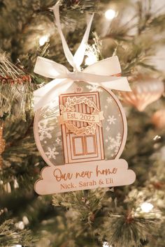 a christmas ornament hanging from the top of a tree