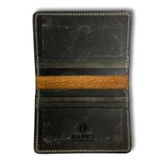 Rugged yet refined, you’ll proudly pull this handsome wallet out of your pocket day after day. Made in the USA from smooth, durable goatskin, these slim wallets will keep your cash and cards safe without added bulk. The Hanks Slimline card case holds everything you need while maintaining a slim profile that can slide easily in a front pocket. Bison Leather outer and Steerhide interior. As the leather ages, the patina develops its own unique characteristics. Dimensions Closed ~4 ½" X 3 1/8" | Ope Bison Leather, Leather Bifold Wallet, Slim Wallet, Card Case, Front Pocket, Leather Wallet, Wallets, Card Holder, Wallet