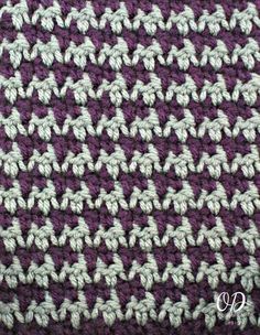 crocheted purple and white dishcloth