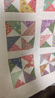 the quilts are all different colors and patterns, but one is not very colorful