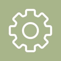 a white gear wheel on a green background