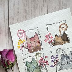 a card with four cats and flowers on it