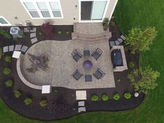 an aerial view of a patio and seating area in a home's front yard