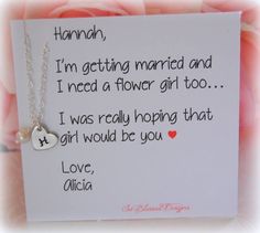 a handwritten note with a heart charm