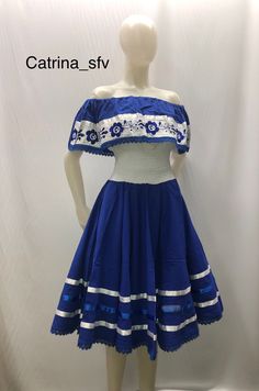 Olán dress with dropped shoulders, the material is a blanket, Olán brings hand-embroidered flowers in royal blue, which are made with (silk thread). The perfect dress for a Central American or Mexican party The dress is one size which the elastic that it brings at the waist expands (CH-M-G-XG) El Salvador Dress, Michoacan Dress, Salvadorian Dress, Honduras Outfit, El Salvador Outfits, Honduras Dress, Mexican Style Clothing, Honduras Clothing, Colombian Dress