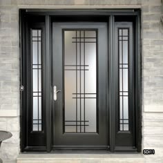 the front door is black and has glass panels