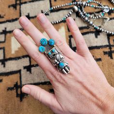 Authentic Turquoise set in Sterling Silver This Turquoise Kachina Ring was handmade by amazing Native American Artist Doris Smallcanyon. Size 8.75 2.25" long Collectible Blue Multi-stone Turquoise Ring, Artisan Multi-stone Turquoise Ring, Turquoise Multi-stone Ring For Gift, Artisan Turquoise Ring Jewelry, Unique Turquoise Multi-stone Rings, Southwestern Multi-stone Turquoise Jewelry, Collectible Multi-stone Blue Turquoise Ring, Unique Blue Turquoise Multi-stone Ring, Unique Turquoise Ring Jewelry