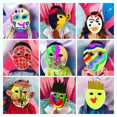 six different masks with faces painted on them in various colors and shapes, all depicting people's faces