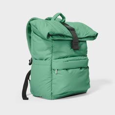 This 16-Inch Puffer Backpack from Open Story™ combines comfort and a convenient design. This fold-over top backpack is designed with a spacious interior, an exterior zip pocket and a padded laptop sleeve that fits up to a 15-inch laptop. Zip closures and buckle straps help keep items secure, and it's designed with padded shoulder straps and a suitcase handle for effortless maneuverability. Made of water-resistant materials, it's great for school, vacations and beyond. Open Story™: Every journey Puffer Backpack, Story Bags, Green Backpack, Square Backpack, Green Puffer, Commuter Backpack, Green Backpacks, Suitcase Handle, Mountain Adventure