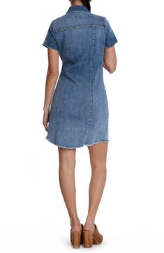 This casual-cool jean dress is designed with abbreviated sleeves and a feathery frayed hem. 35 1/2" front length; 36 1/2" back length Front button closure Spread collar Short sleeves 96% cotton, 3% polyester, 1% spandex Machine wash, tumble dry Imported Trendy Fitted Denim Dress With Frayed Hem, Fitted Denim Dress With Frayed Hem, Relaxed Fit Denim Dress With Frayed Hem, Fitted Blue Denim Dress With Frayed Hem, Denim Blue Dress With Frayed Hem, Fitted Cotton Denim Dress With Frayed Hem, Fitted Denim Blue Dress With Frayed Hem, Trendy Dark Wash Dress With Frayed Hem, Medium Wash Denim Dress With Frayed Hem